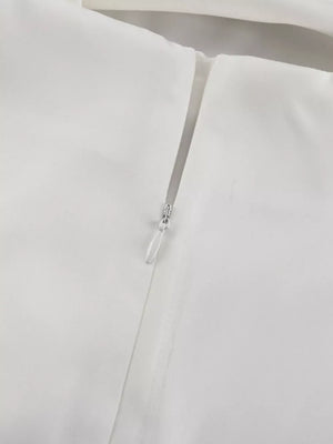 White dress with invisible zipper closure