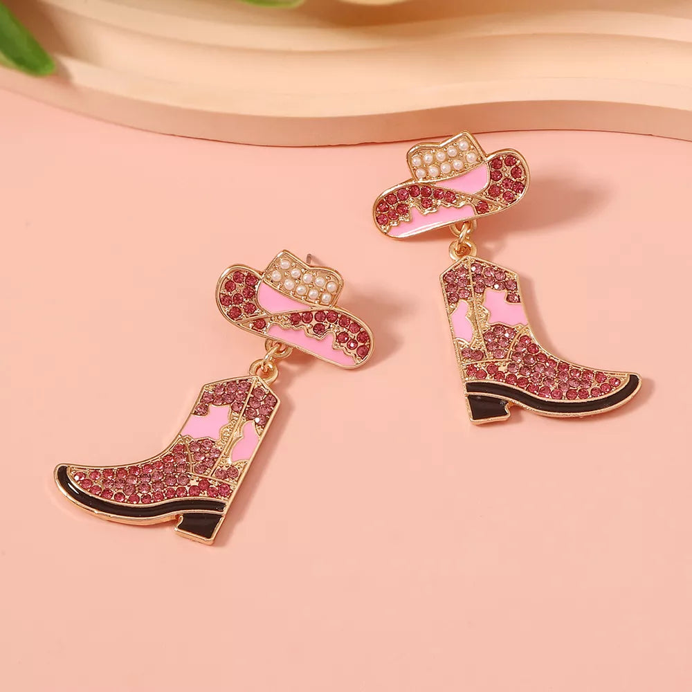 earrings in pink featuring rhinestone embellishment and dangle fit