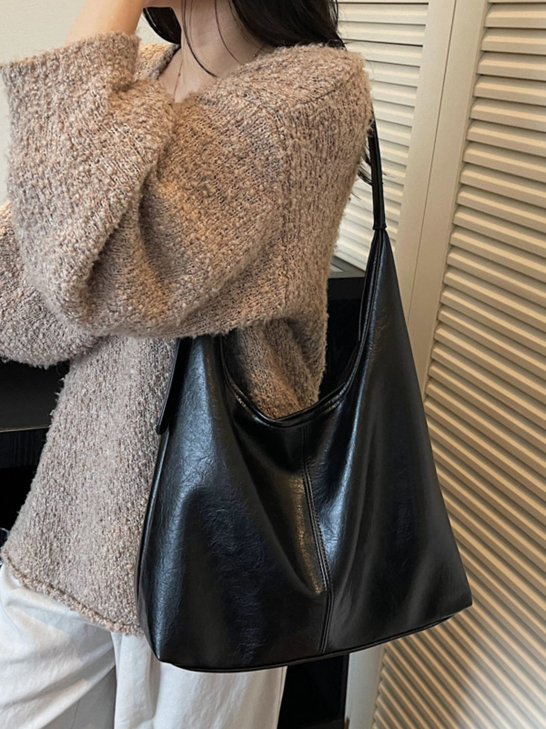 Black PU Leather Shoulder Bag in black with soft construction