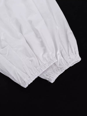 White puff sleeves with elastic cuffs
