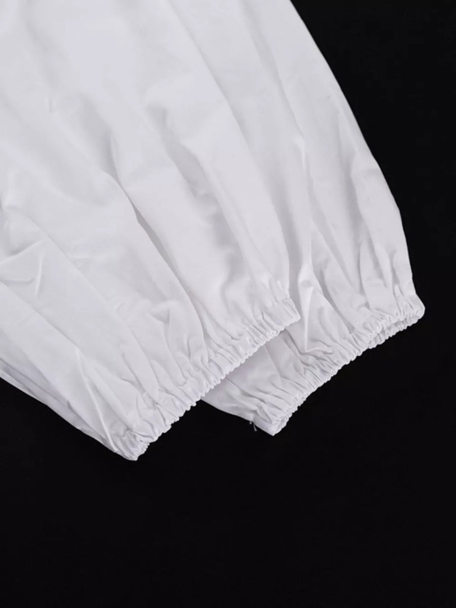 White puff sleeves with elastic cuffs