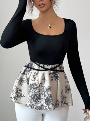 Black long-sleeve top with a floral peplum hem and square neckline