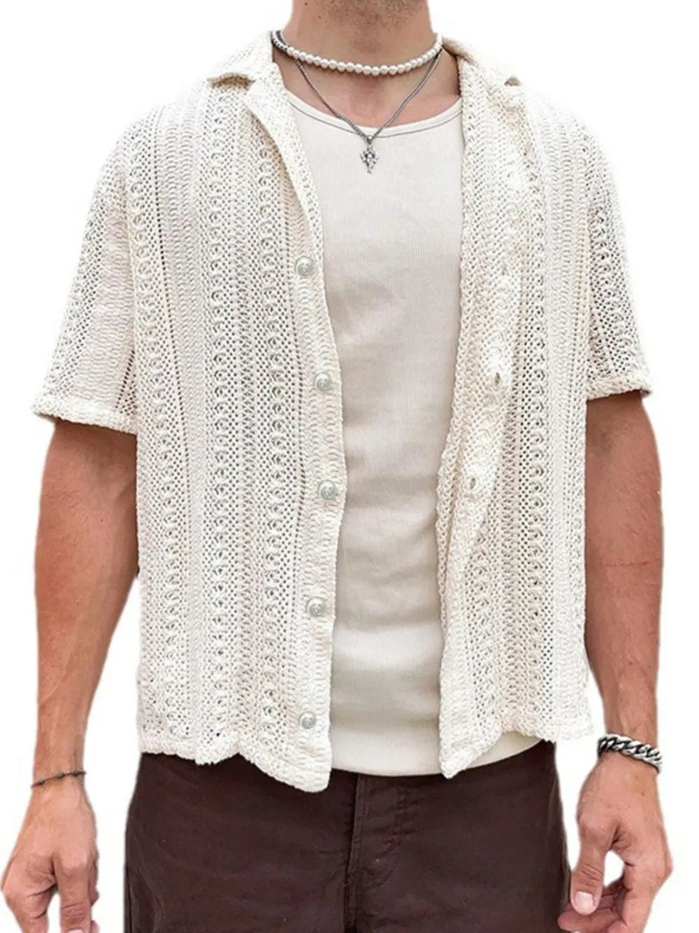Open-knit resort shirt in white with button-down front and short sleeves.