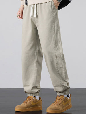 joggers in Black with drawstring waist and full-length