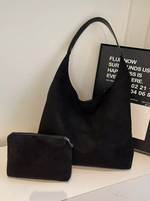 Black suede hobo bag with matching mini pouch and leather strap