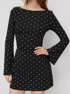 black mini dress with polka dot and boat neck