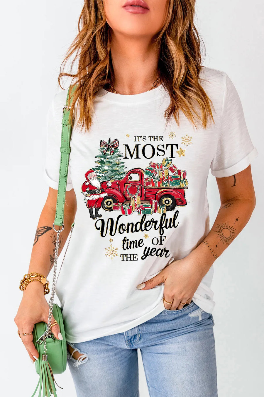 White graphic tee with festive Christmas truck, Santa, tree, and gifts design.