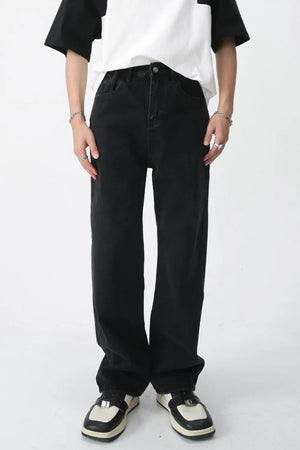 Wide-leg black denim trousers with a relaxed fit and casual style.