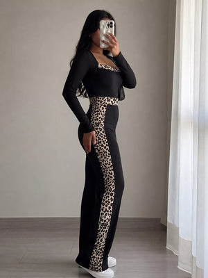 jumpsuit in Black with leopard and leopard trim