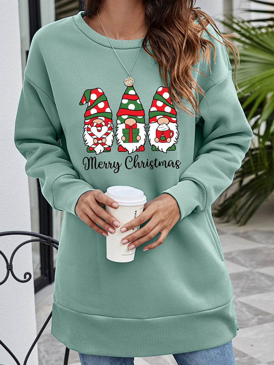 Sage green tunic sweatshirt with Christmas gnomes graphic and Merry Christmas text.