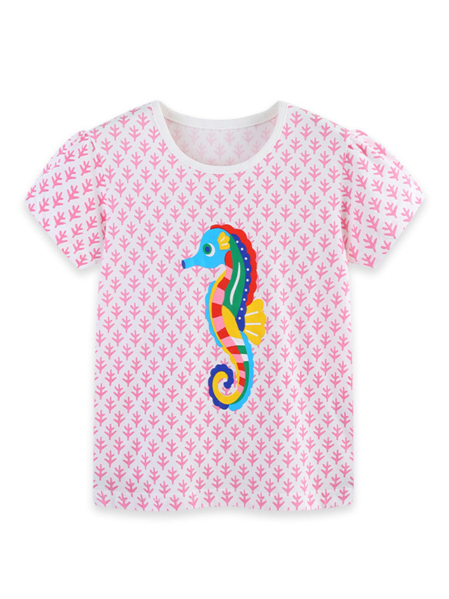 White cotton crew neck t-shirt with pink leaf pattern and colorful seahorse graphic.