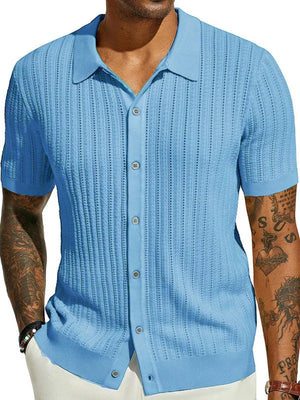 Light blue textured knit polo shirt with openwork detail and short sleeves.
