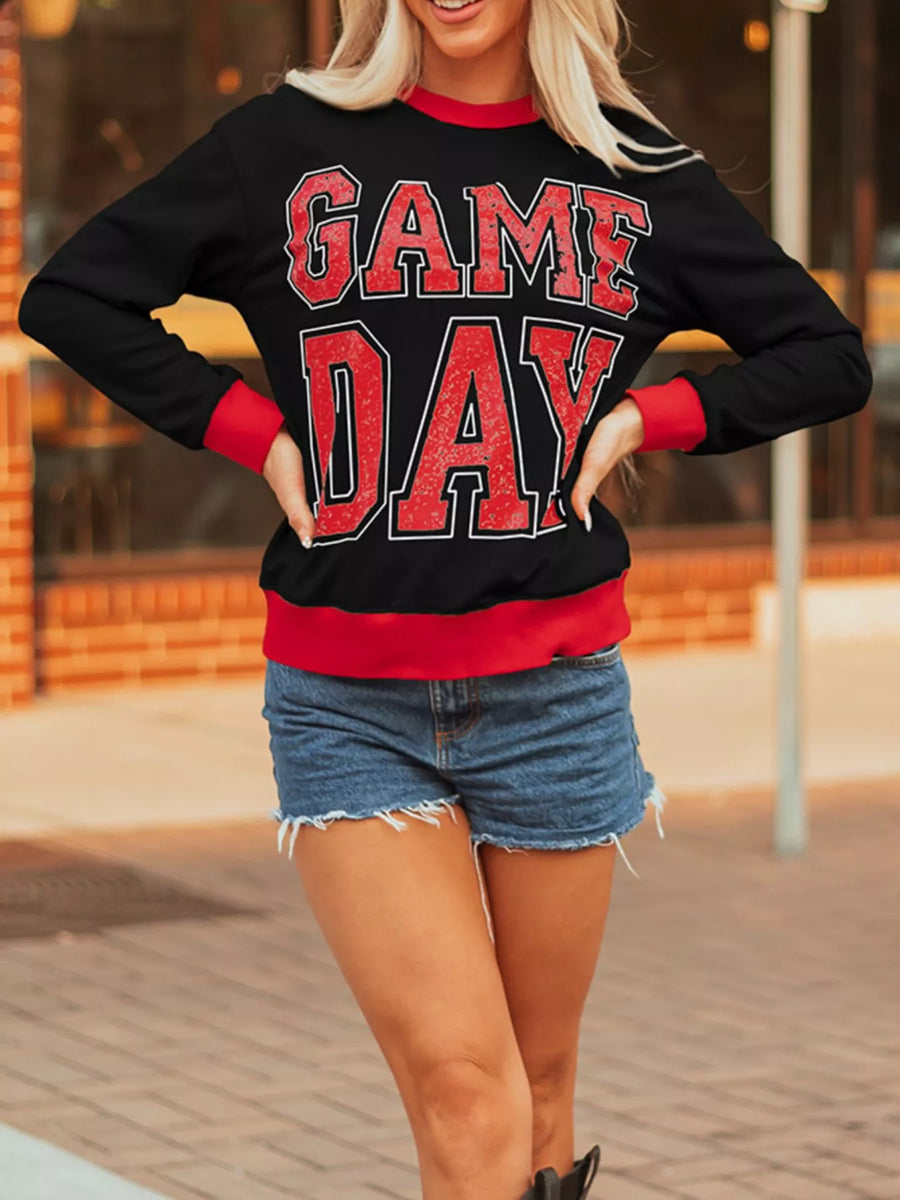 Black sweatshirt with red GAME DAY varsity graphic and red trim