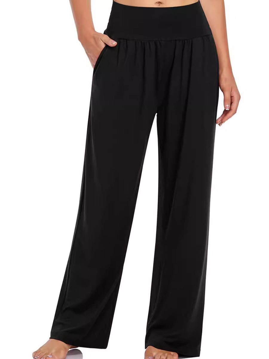 wide-leg pants in black featuring pocketed and relaxed fit