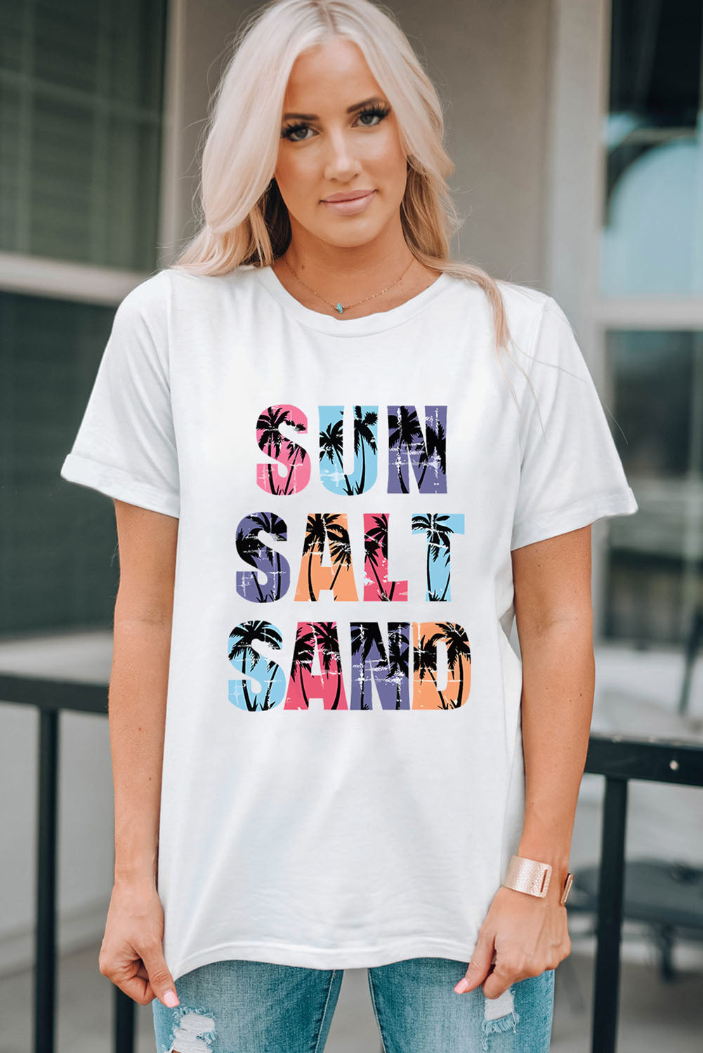 White t-shirt with sun salt sand palm tree graphic print