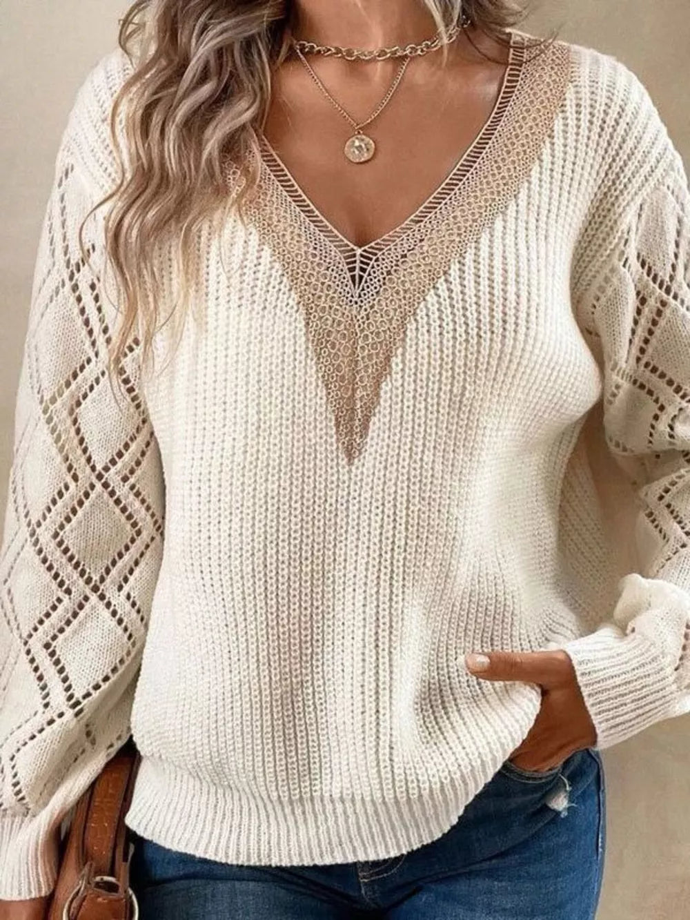 100% polyester Care instructions: Machine wash cold v-neck sweater in Beige with regular silhouette
