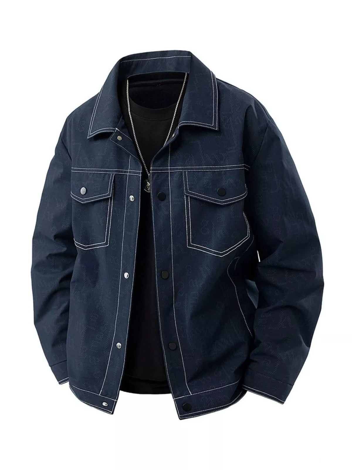 Oversized denim trucker jacket in dark blue with white contrast stitching and snap buttons.