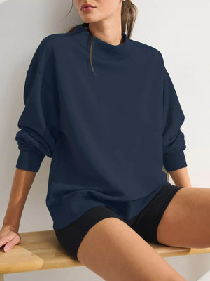 Red sweatshirt with ribbed cuffs and long sleeve