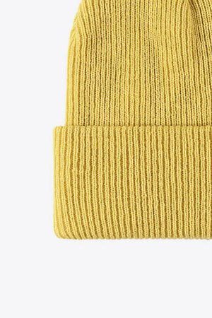 Yellow ribbed knit beanie with a folded cuff