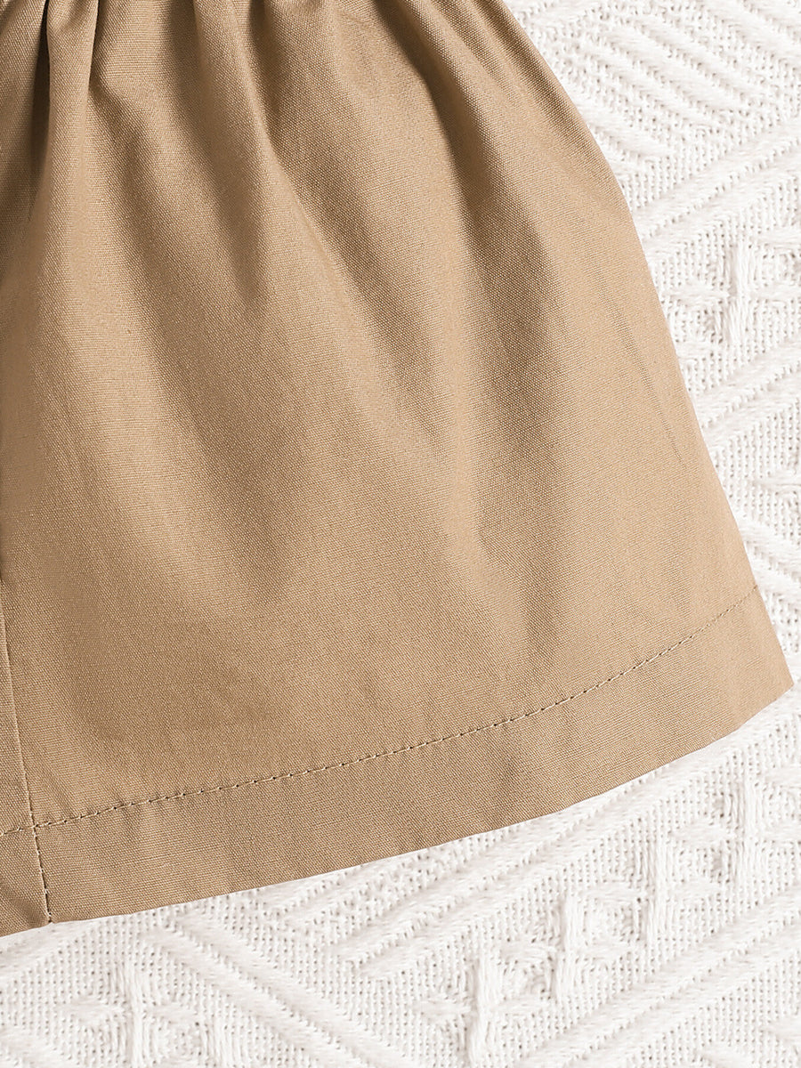 Baby girl's camel bow top and shorts set with leaf print detail.