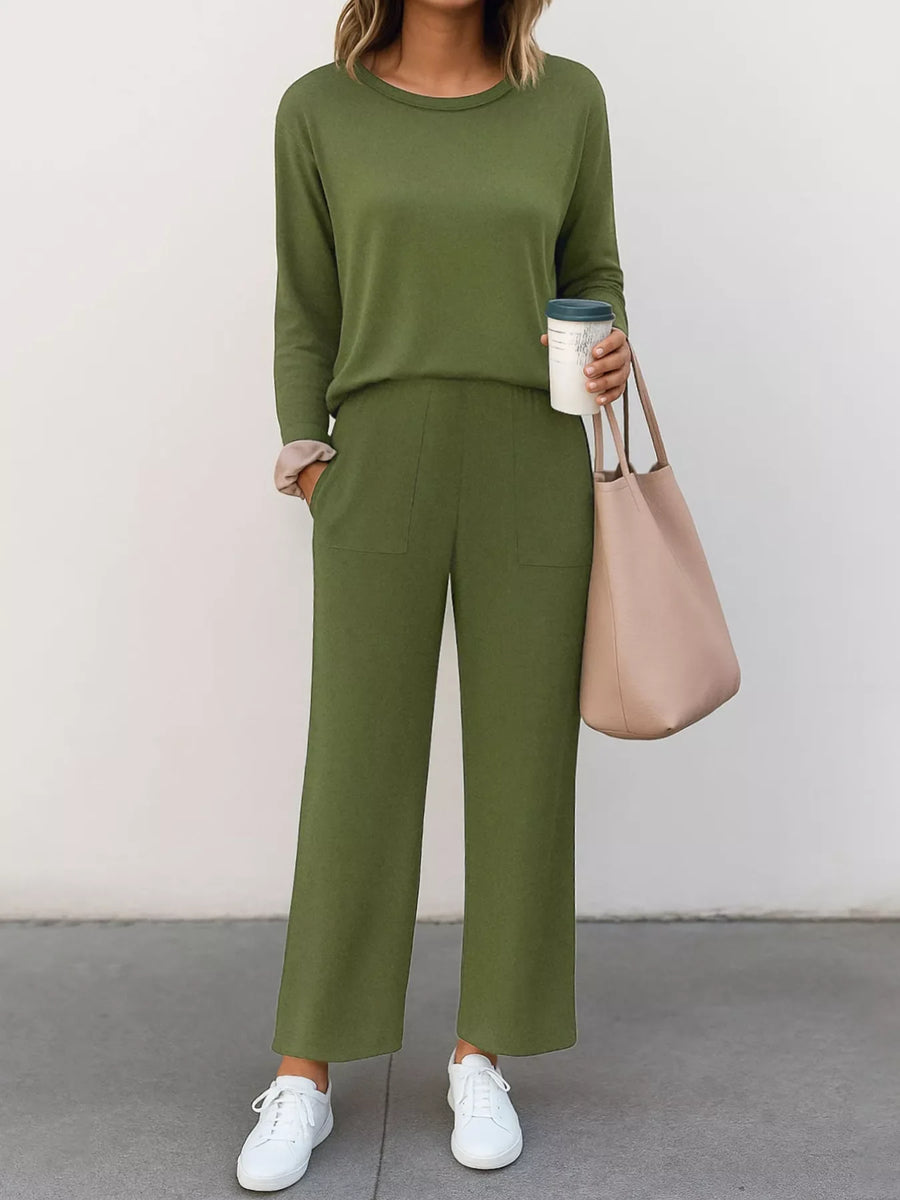Moss green two-piece loungewear set with crew neck top and wide-leg pants with pockets.