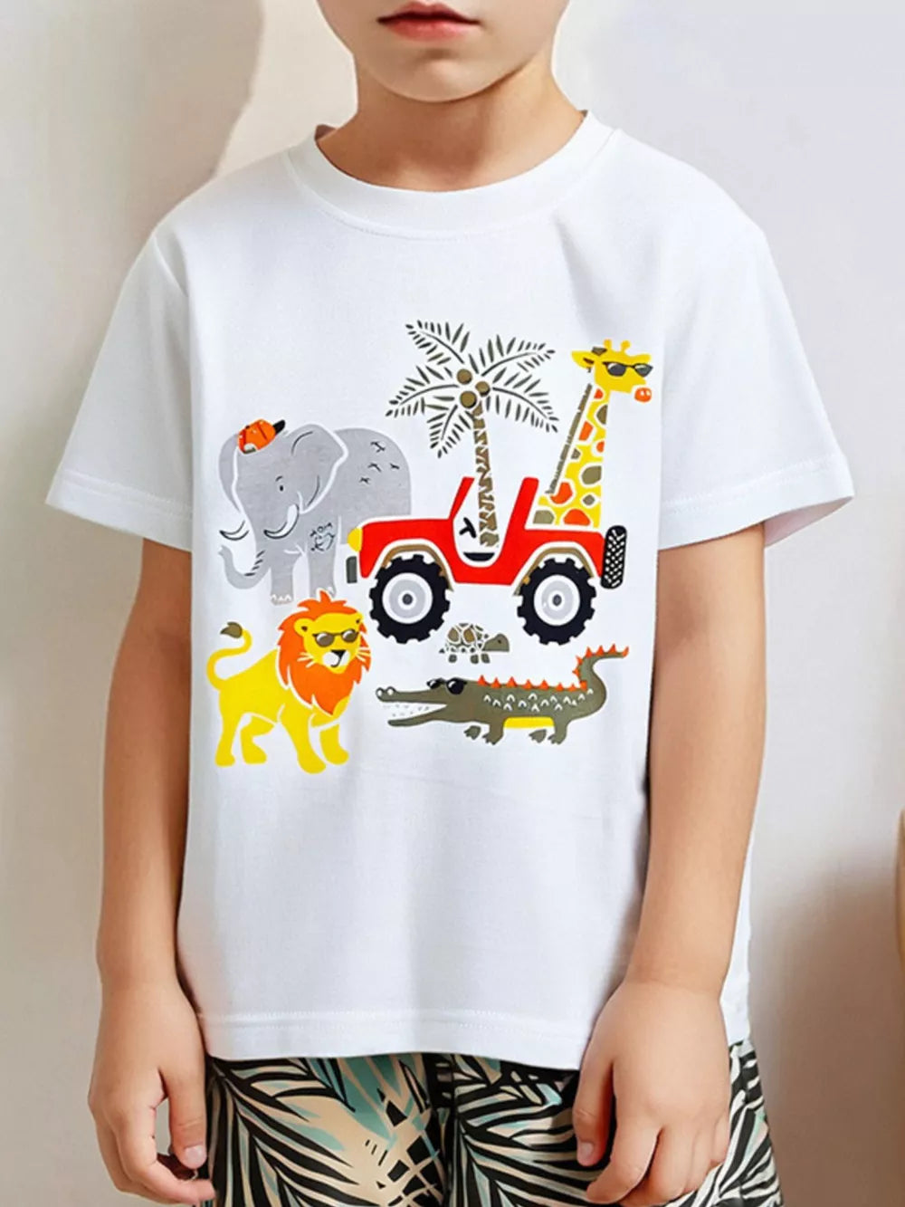 White cotton graphic tee with safari animals and jeep print, short sleeves, crew neck