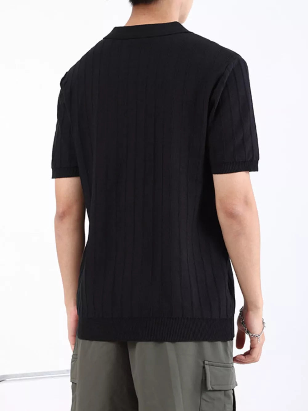 Black ribbed knit short sleeve polo shirt for men with a classic collar.