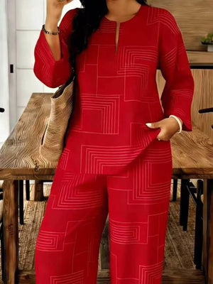 Red geometric print wide leg pants and matching tunic with split neckline and bell sleeves