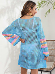 Light blue crochet cover-up with striped bell sleeves and a scoop neck.