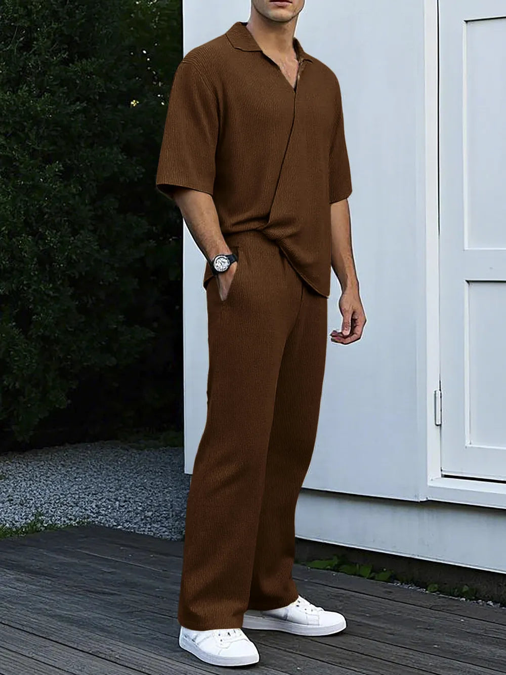 Brown ribbed knit short sleeve polo shirt and wide leg pants set.