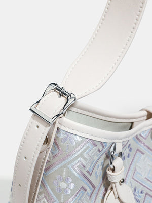 light blue handbag with zip and geometric
