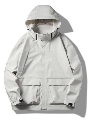 Hooded windproof jacket in Fog Lotus White with two chest pockets and two large front pockets.