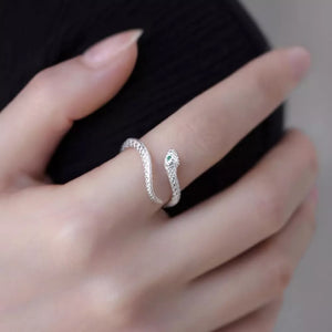 Silver ring featuring adjustable and snakeskin