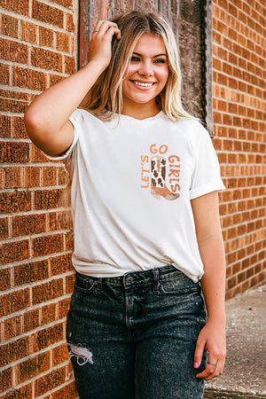 White graphic tee with "Let's Go Girls" and cowboy boot design