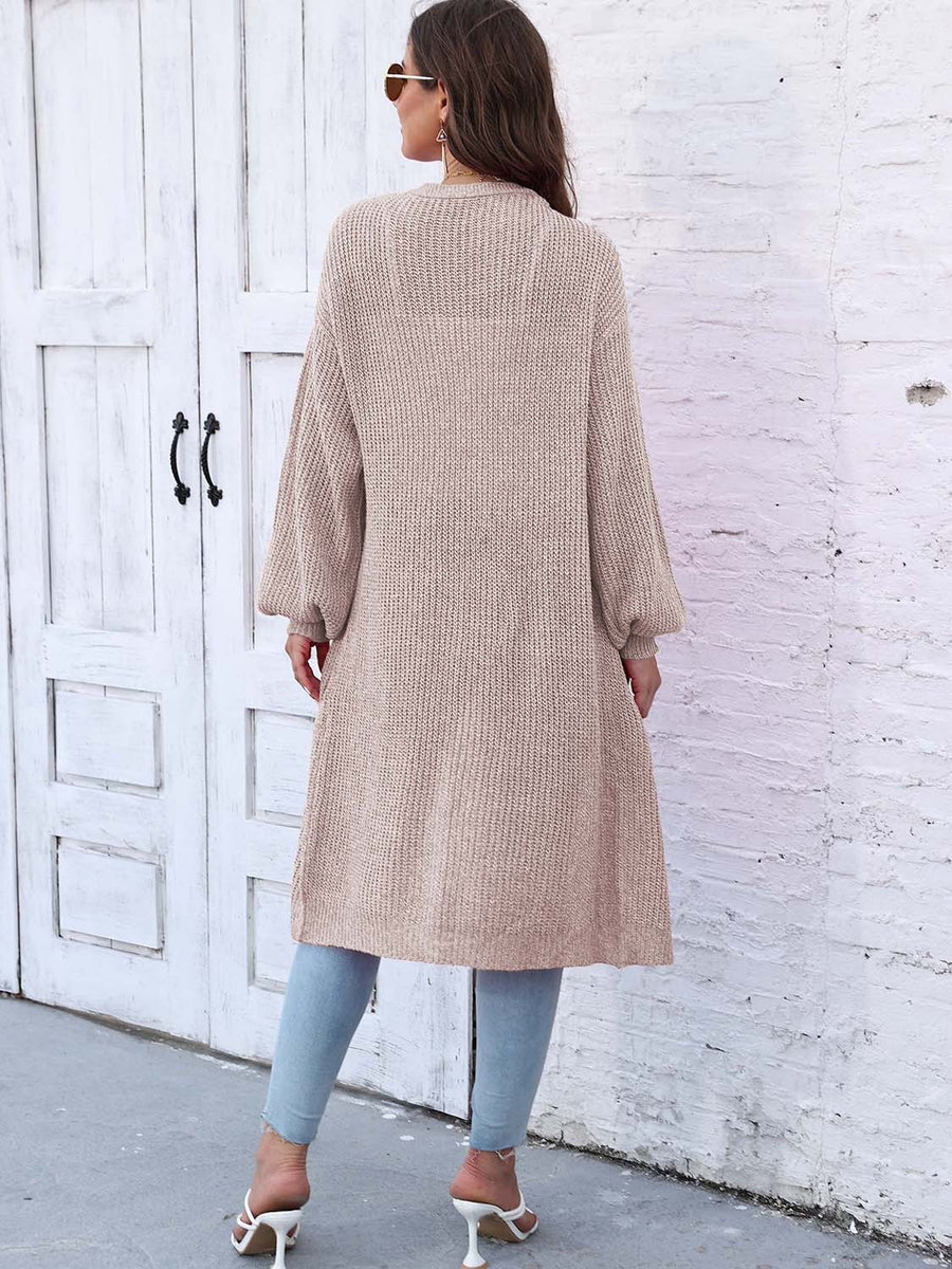 Ribbed knit maxi cardigan in khaki with long sleeves and pockets.