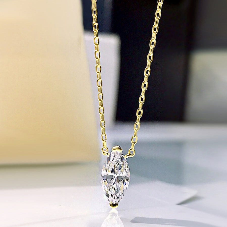 Gold chain necklace with marquise cut zircon pendant
