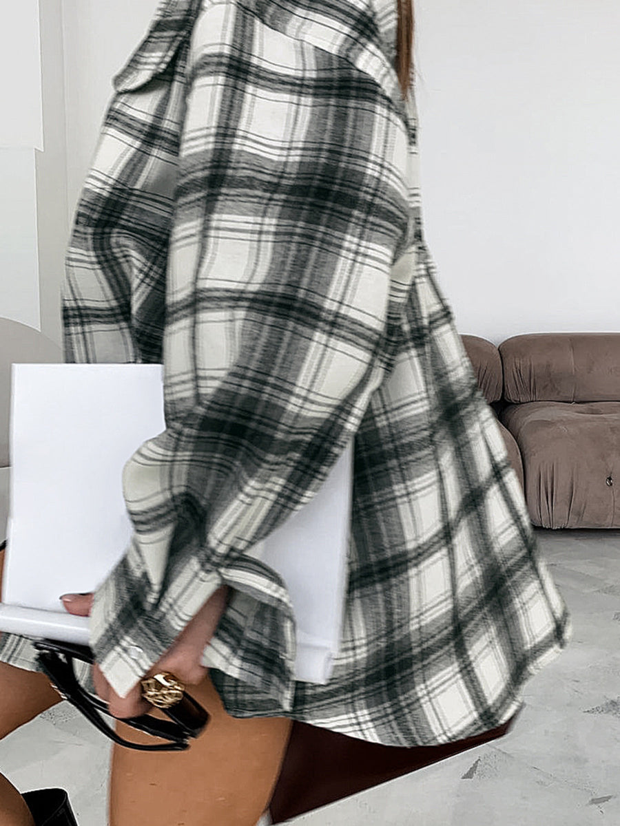 Button-up long sleeve shirt in black and white plaid cotton, featuring a casual chic style.