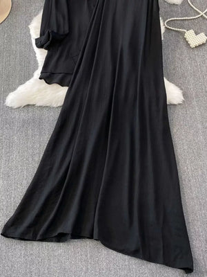 Black embroidered floral two-piece set with collared top and flowing skirt