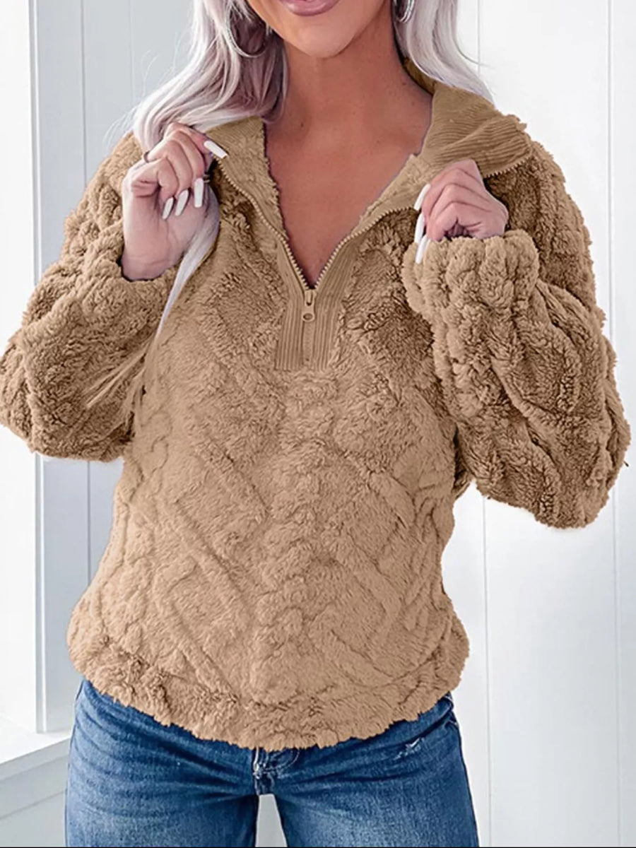 Textured fleece quarter zip sweatshirt in khaki with a diamond pattern and a zip neckline.