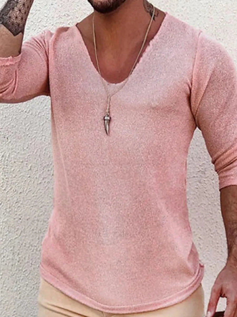 Textured slouchy v-neck knit top in Dusty Pink with a relaxed fit and raw hem detail.