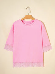 Pink cotton blend oversized tee with floral lace trim on sleeves and hem.