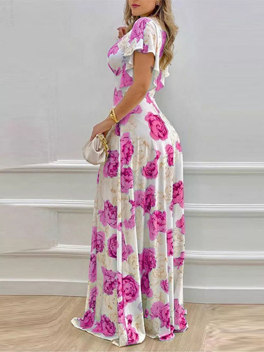 Maxi dress with V-neck, ruffle sleeves, and a bold floral print in Fuchsia Pink.
