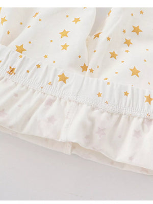Baby girls' pajama shorts in blush pink with gold stars and ruffled hem