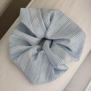 light gray scrunchie with elastic and gingham, plaid, striped
