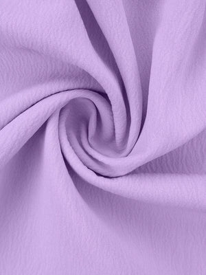 Pink Purple polyester pajama fabric with a ruffled texture detail.