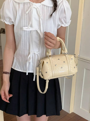 pale yellow crossbody bag with mini and zip-front