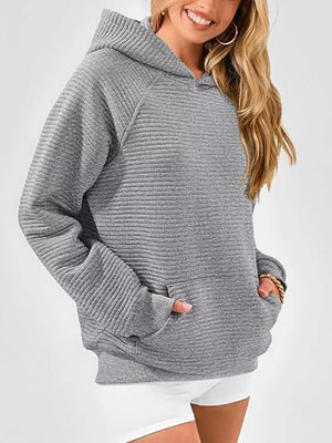Blue pullover hoodie featuring kangaroo pocket and ribbed