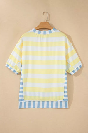 Striped t-shirt with yellow, white, and blue horizontal stripes and blue vertical stripes at the hem.