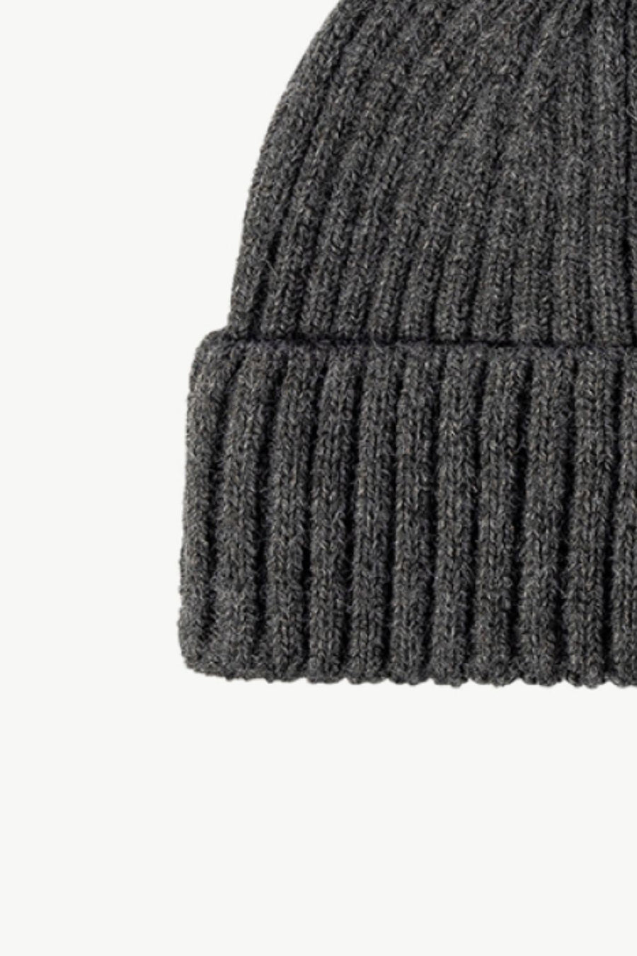 Chunky ribbed knit beanie in dark gray acrylic with a cuffed hem.