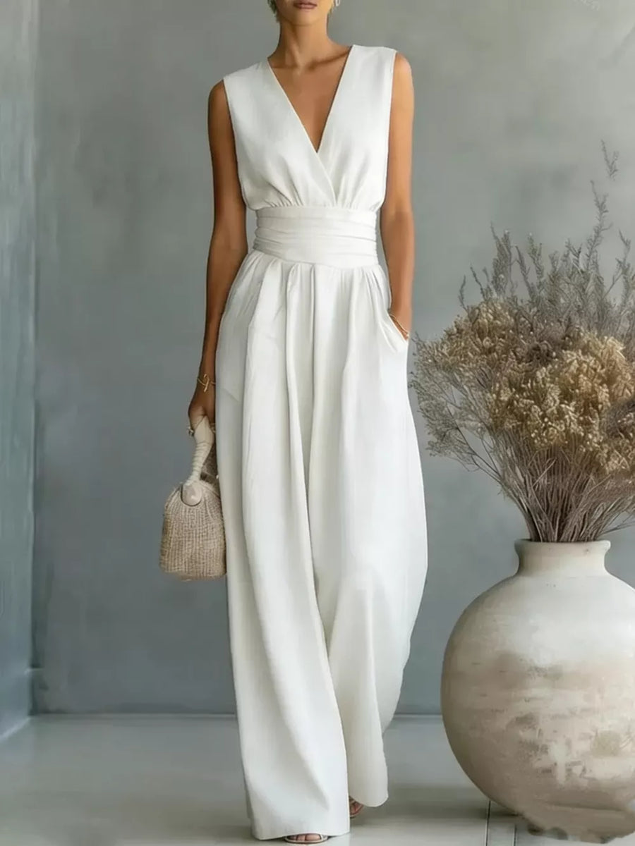 White sleeveless wide-leg jumpsuit with V-neck and belted waist